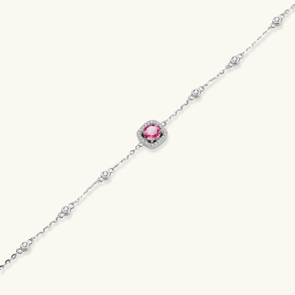 Elegant sterling silver chain bracelet featuring pink moissanite center stone in cushion halo setting with adjustable clasp