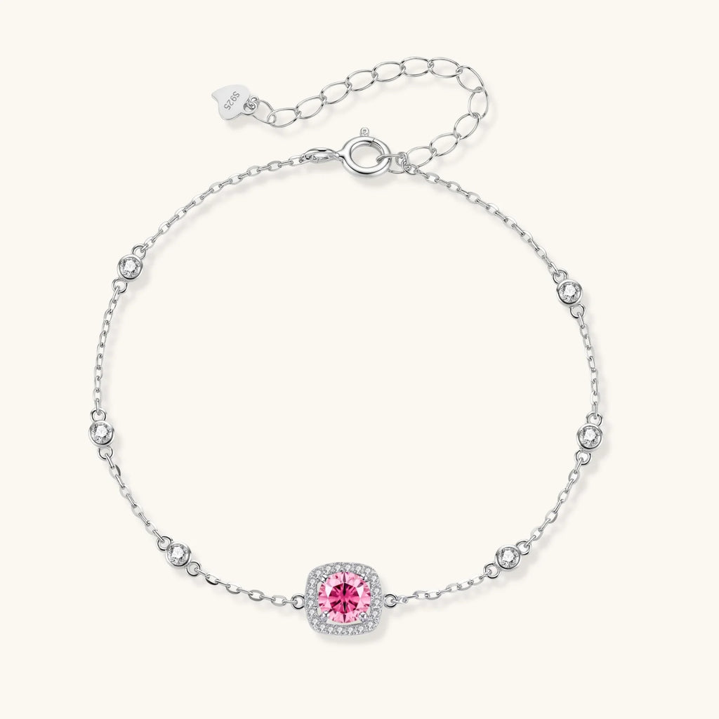 Elegant sterling silver chain bracelet featuring pink moissanite center stone in cushion halo setting with adjustable clasp