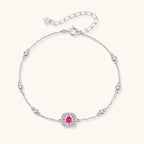Elegant sterling silver chain bracelet featuring pink moissanite center stone in cushion halo setting with adjustable clasp