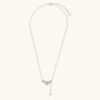 White gold plated Y-shaped necklace with three dimensional flower charms and adjustable drop pendant